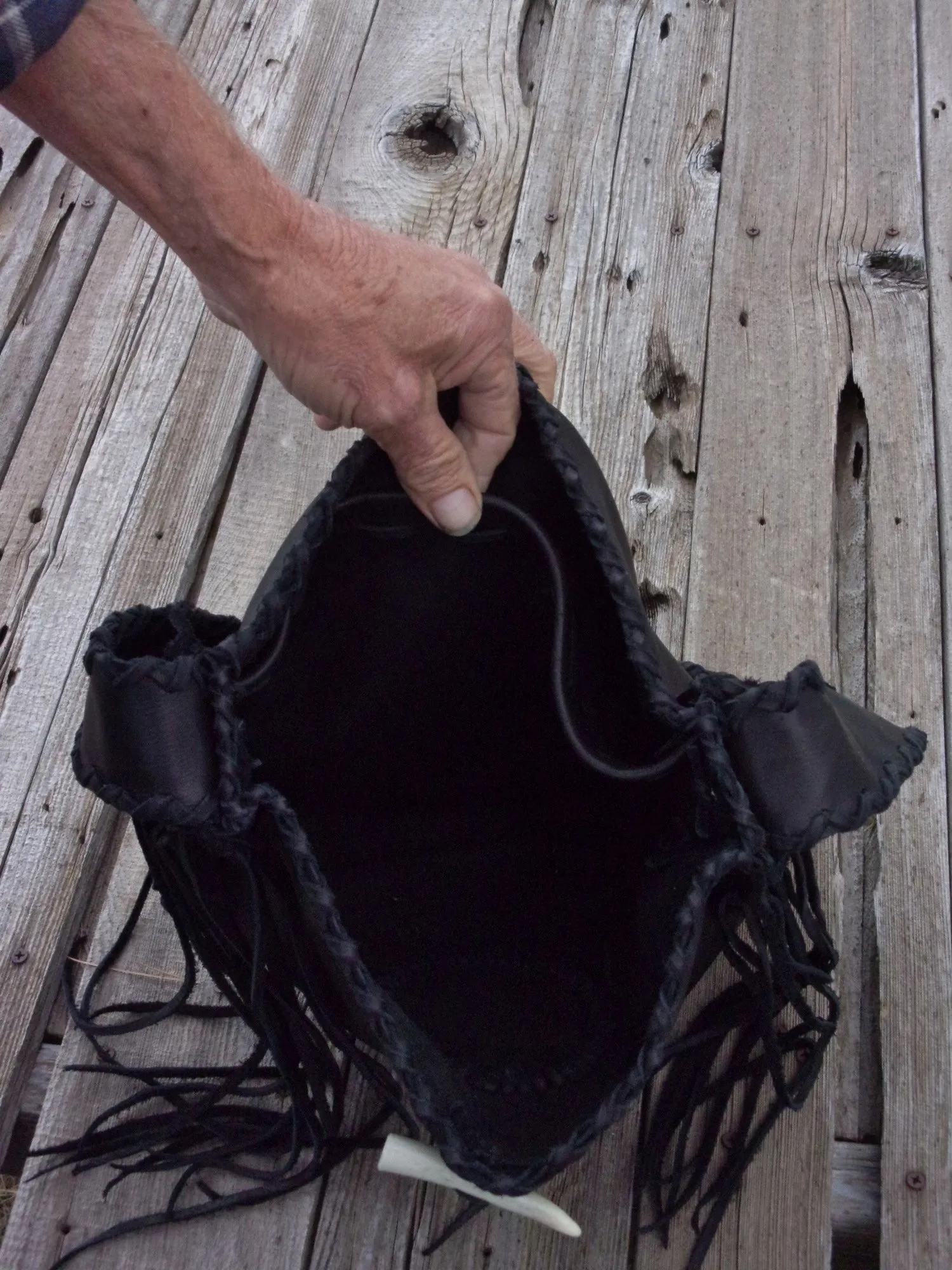 Black leather tote with wolf paw totem